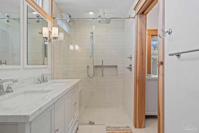 800 Via Deluna Dr, Pensacola Beach, FL 32561 - bathroom with a sink, tiled shower, and double vanity