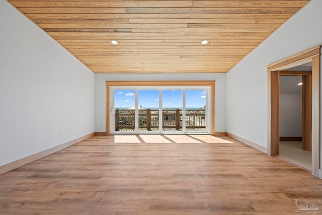 800 Via Deluna Dr, Pensacola Beach, FL 32561 - spare room featuring wooden ceiling, wood finished floors, baseboards, and vaulted ceiling