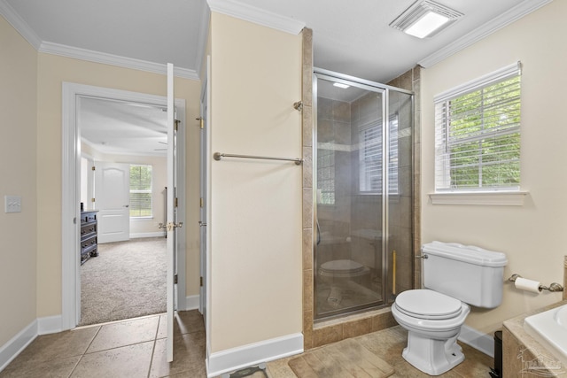 4621 Riley Rd, Milton, FL 32583 - bathroom with a stall shower, ornamental molding, a relaxing tiled tub, and tile patterned flooring