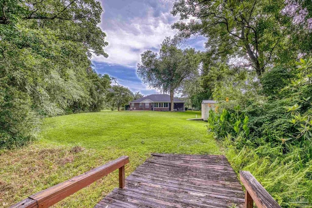 4621 Riley Rd, Milton, FL 32583 - view of grassy yard with a shed