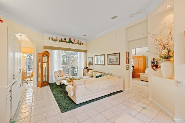 living room with light tile patterned flooring and ornamental molding