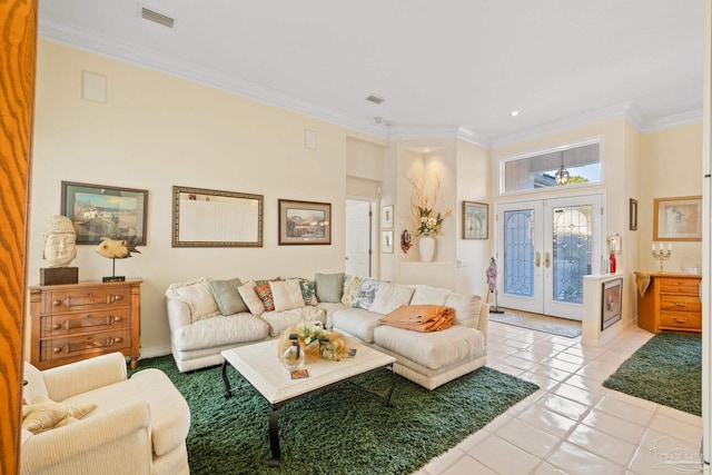 living room with french doors, light tile patterned floors, and ornamental molding