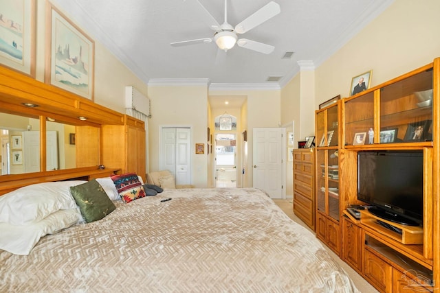 bedroom with ceiling fan, a closet, and ornamental molding