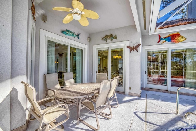 view of patio / terrace featuring ceiling fan