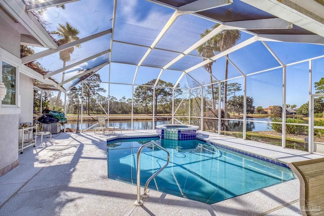 view of swimming pool featuring glass enclosure, a water view, an in ground hot tub, and a patio