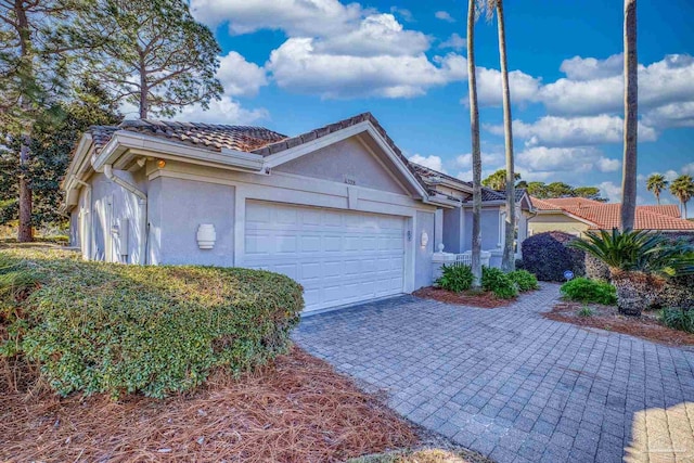 view of front of property featuring a garage