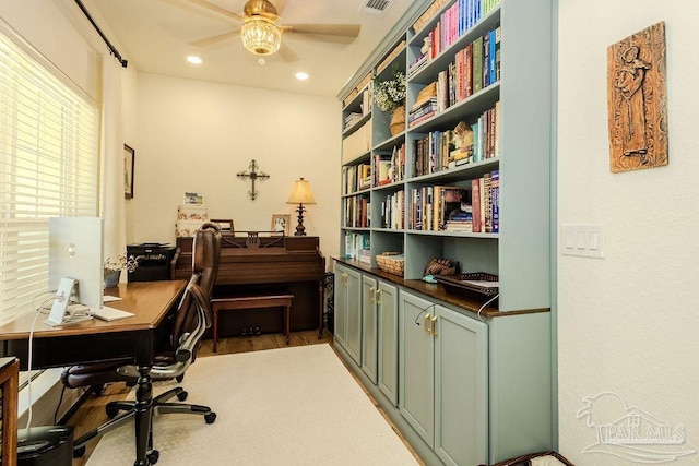 office area with a ceiling fan, recessed lighting, and visible vents