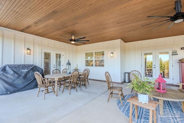 view of patio featuring a ceiling fan, french doors, and outdoor dining area