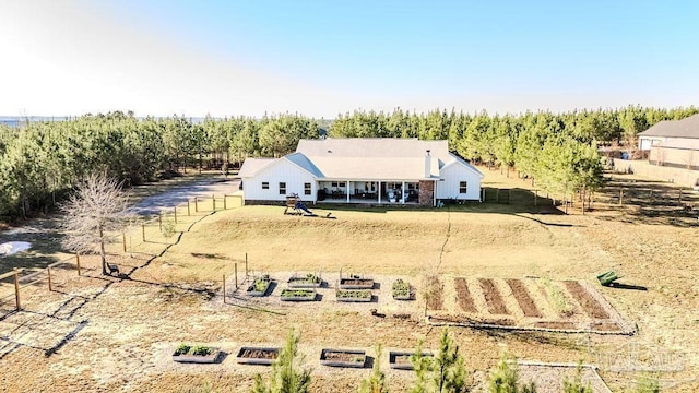 birds eye view of property featuring a rural view