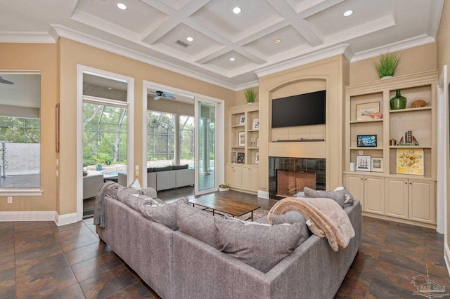337 Grande Oaks Blvd, Cantonment, FL 32533 - living room with a tile fireplace, built in features, recessed lighting, ceiling fan, and coffered ceiling