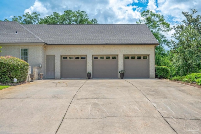 337 Grande Oaks Blvd, Cantonment, FL 32533 - garage featuring driveway