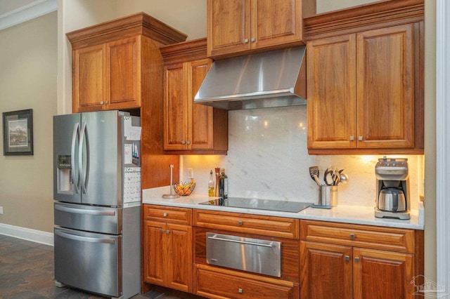 337 Grande Oaks Blvd, Cantonment, FL 32533 - kitchen with stainless steel fridge, exhaust hood, a warming drawer, black electric cooktop, and light countertops