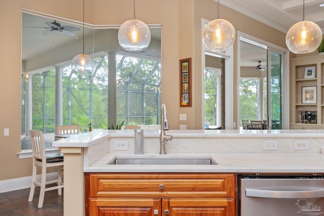 337 Grande Oaks Blvd, Cantonment, FL 32533 - kitchen featuring a ceiling fan, stainless steel dishwasher, a sink, and light countertops