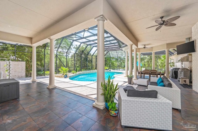 337 Grande Oaks Blvd, Cantonment, FL 32533 - outdoor pool with ceiling fan, outdoor lounge area, a patio area, glass enclosure, and a grill