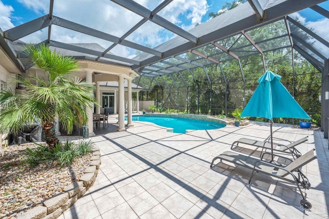 337 Grande Oaks Blvd, Cantonment, FL 32533 - swimming pool with a patio, a ceiling fan, and glass enclosure