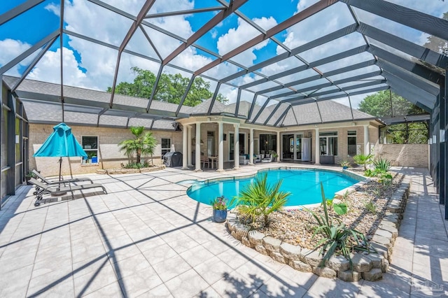 337 Grande Oaks Blvd, Cantonment, FL 32533 - outdoor pool with a patio and glass enclosure