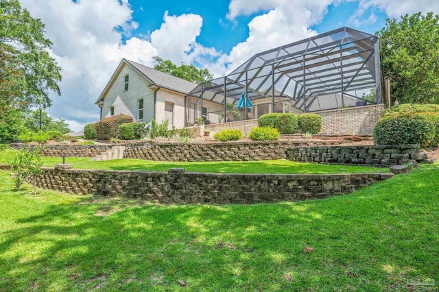337 Grande Oaks Blvd, Cantonment, FL 32533 - back of house with a lawn and glass enclosure