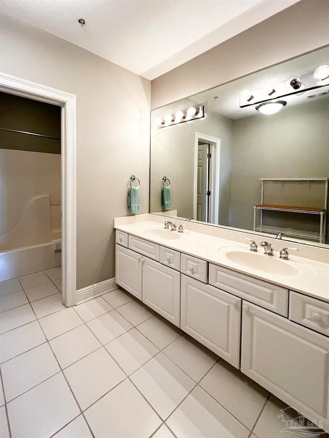 bathroom featuring vanity and tile patterned floors