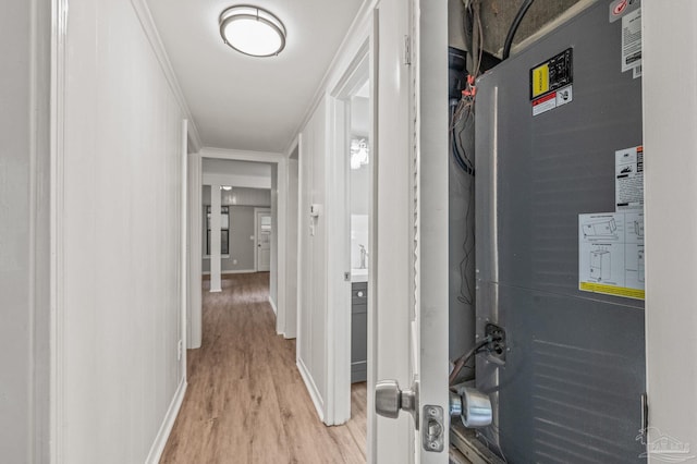 4905 State St, Pensacola, FL 32506 - corridor featuring light wood-type flooring, baseboards, and heating unit