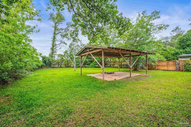 4905 State St, Pensacola, FL 32506 - view of yard featuring a patio area