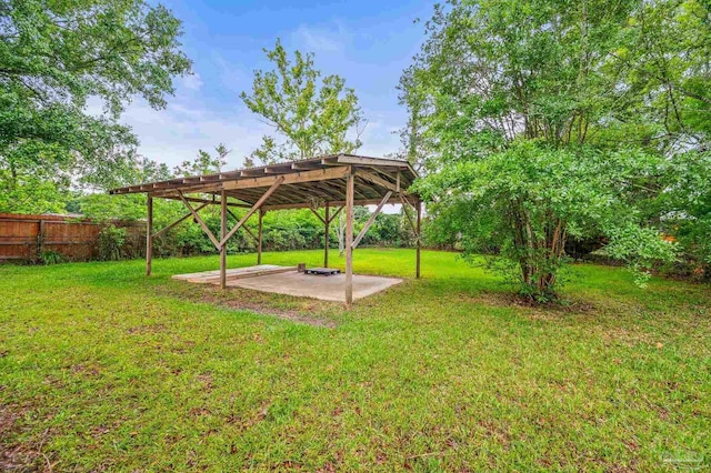 4905 State St, Pensacola, FL 32506 - view of yard featuring a patio