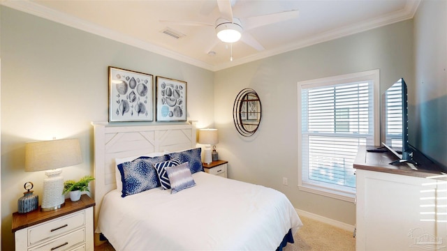 bedroom featuring ceiling fan, light carpet, and ornamental molding