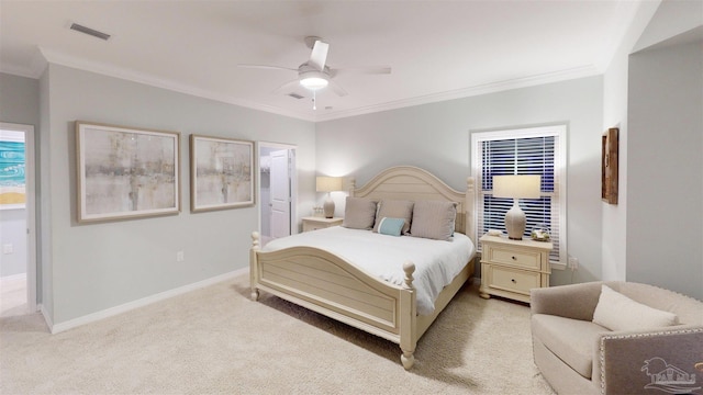 carpeted bedroom featuring ceiling fan and ornamental molding