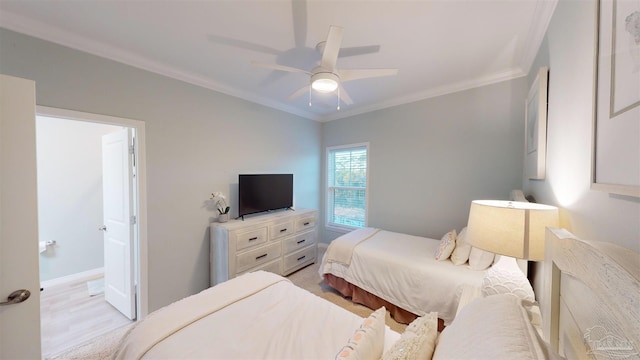 bedroom with ceiling fan and ornamental molding