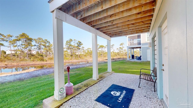 view of patio / terrace featuring a water view