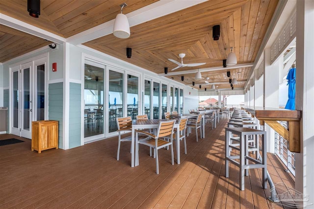 deck featuring french doors and ceiling fan