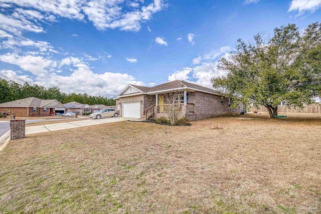 ranch-style house with a garage and a front yard