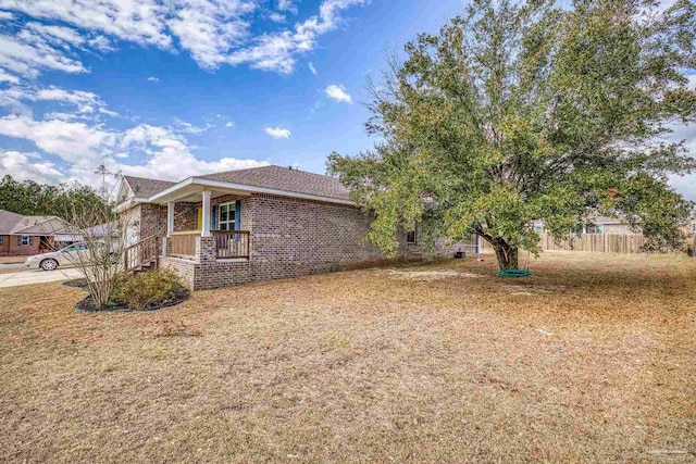 view of home's exterior with a lawn