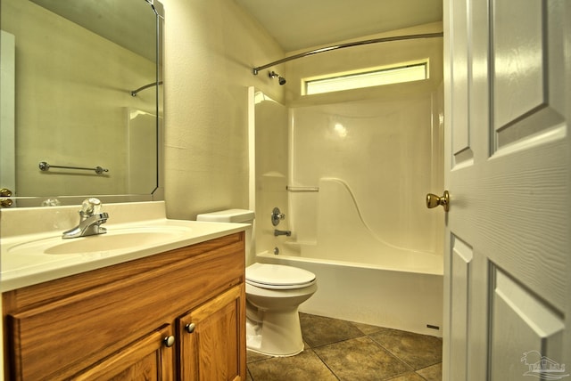 bathroom featuring shower / bathing tub combination, vanity, toilet, and tile patterned floors