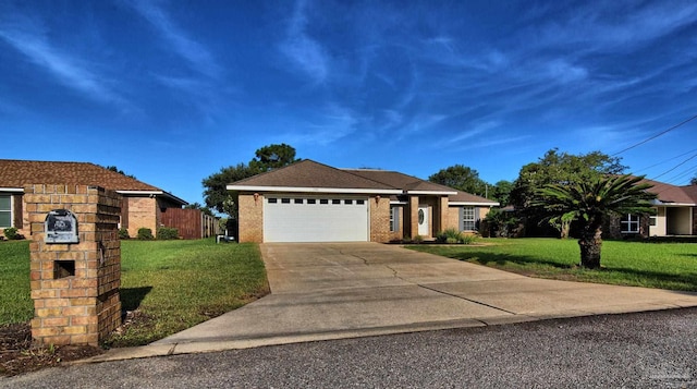 ranch-style home featuring a garage and a front lawn