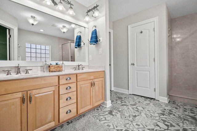 full bathroom with tile patterned flooring, vanity, shower / bathtub combination, and toilet