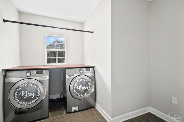 washroom featuring washer and clothes dryer