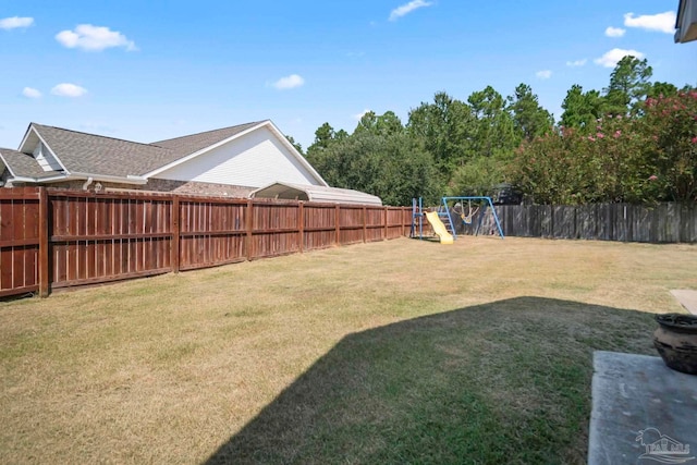 view of yard with a playground