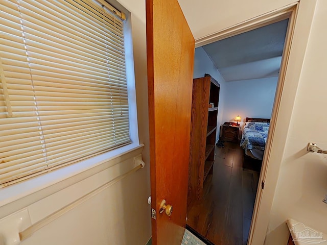 corridor featuring wood-type flooring