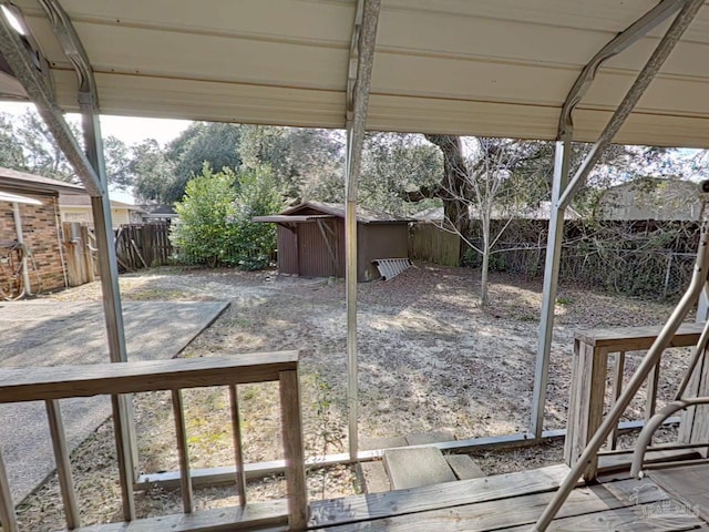 view of patio / terrace featuring a storage shed