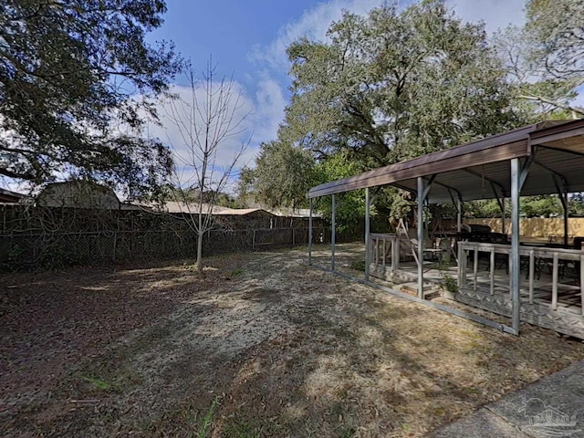 view of yard with a carport