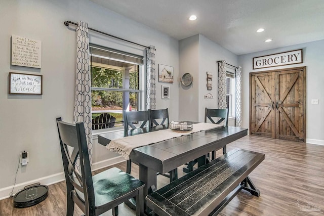 2685 Segrest Rd, Pace, FL 32571 - dining area featuring baseboards, wood finished floors, and recessed lighting