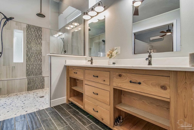 2685 Segrest Rd, Pace, FL 32571 - full bath with a walk in shower, double vanity, ceiling fan, wood tiled floors, and ornamental molding