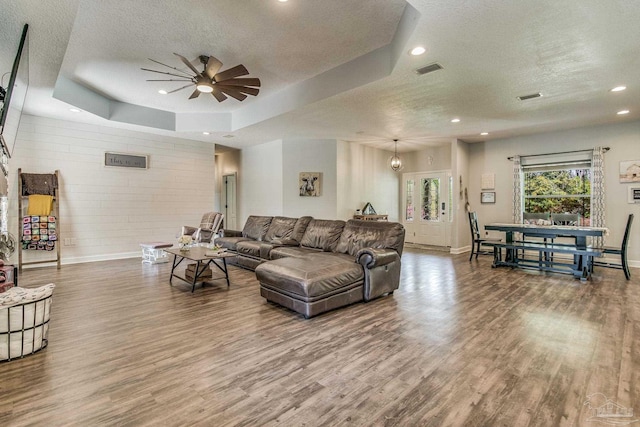 2685 Segrest Rd, Pace, FL 32571 - living area with a textured ceiling, a ceiling fan, baseboards, wood finished floors, and recessed lighting