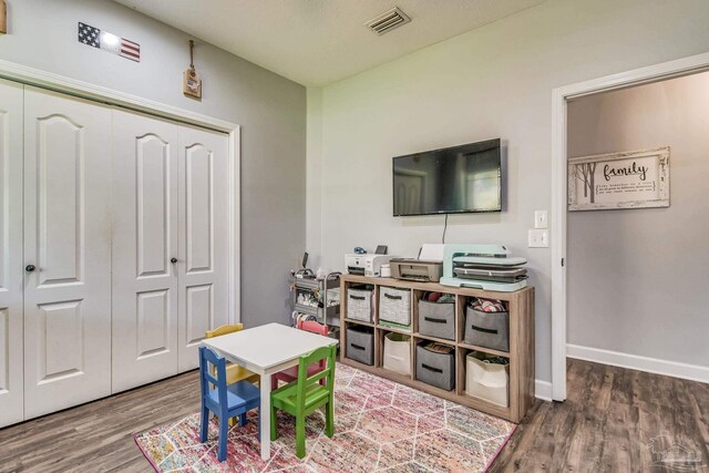 2685 Segrest Rd, Pace, FL 32571 - rec room with wood finished floors and baseboards