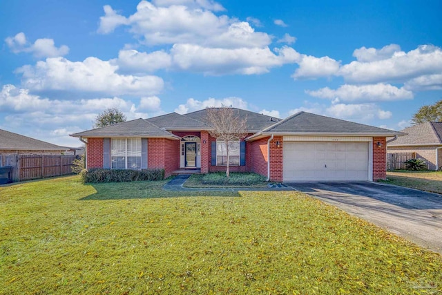 single story home featuring a garage and a front lawn