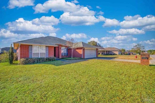 ranch-style home featuring a garage and a front yard