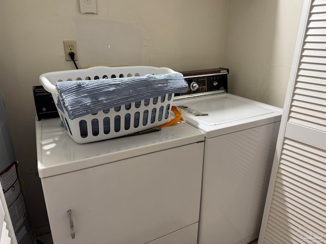 washroom featuring separate washer and dryer