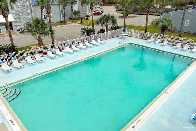 view of pool featuring a patio area