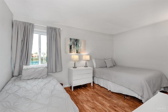 bedroom featuring wood-type flooring