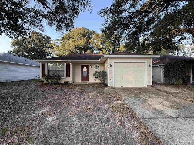 single story home featuring a garage